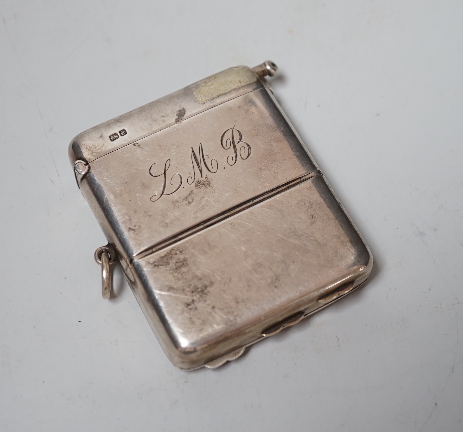 An Edwardian silver combination calling card, sovereign, vesta and pencil holder case, William Neale & Sons, Chester, 1904, 76mm.